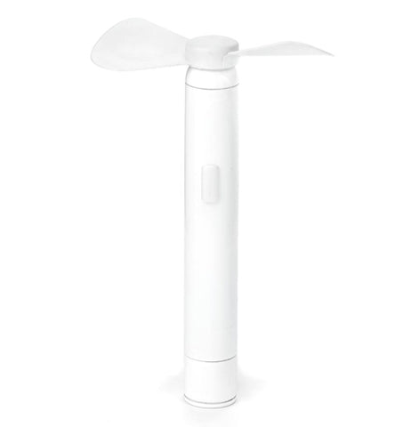 A white, two pronged fan. There is a small button on the front.