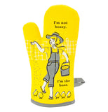 This oven mitt has a yellow fabric featuring a farmer girl in a gray hat and overalls feeding baby chicks with a black text above and below that says, "I'm Not Bossy, I'm the Boss".