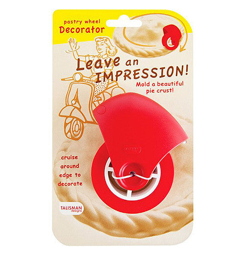 Pastry cutter that cuts pastries with a red blade.