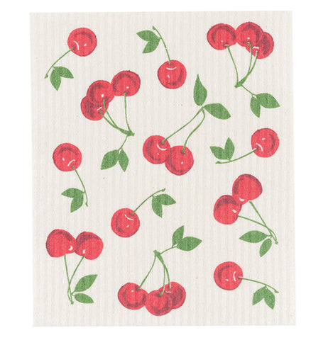 This white dishcloth has a design of red cherries covering it.