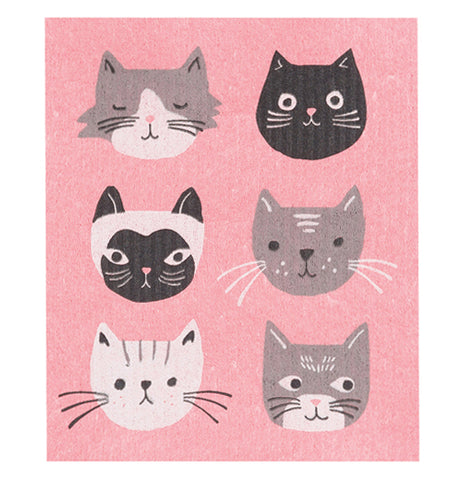 This pink dishcloth features a design of 6 different cat faces: a black cat, a siamese cat, a white cat, a gray cat, and two gray and white cats.