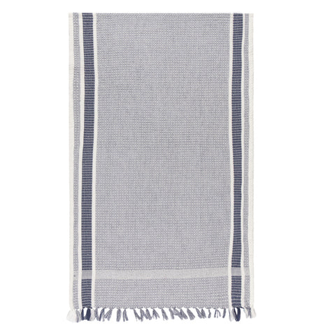 An indigo tea towel with gray in its center and black stripes on the sides. 