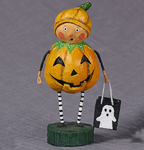 The "Punkin Pie" figurine sits on a dark gray background. 