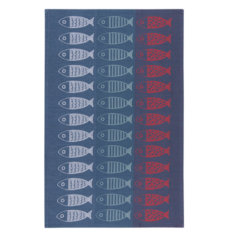 This ocean blue tea towel features a design of red, white, and light blue fish.