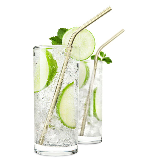 Two of the golden steel straws are shown inside some drinks.
