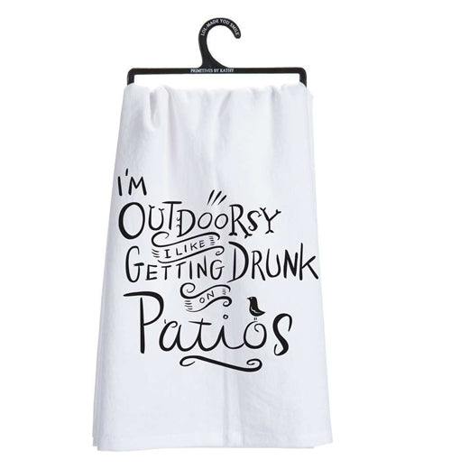 This white dish towel on a hanger contains black text saying, "I&