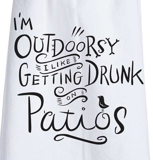 This close-up is of the white dish towel containing black text saying, "I&
