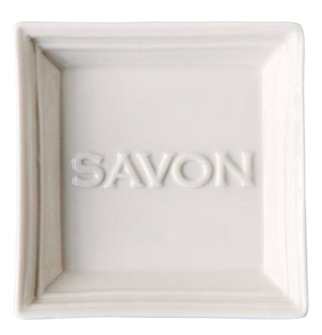 This soap holding dish is shown with the word, "Savon" stenciled in the middle.