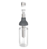Clear infusion carafe with black and silver lid.