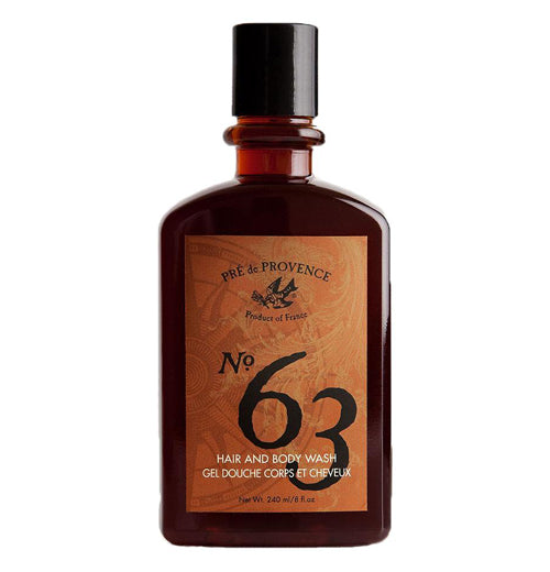 The bottle says "Pre de Provence No. 63." There is a black bird and a gold swirl.