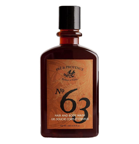 The bottle says "Pre de Provence No. 63." There is a black bird and a gold swirl.