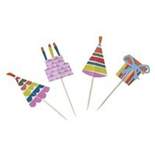 Four of the 24 cupcake toppers taken out from the "Eat More Cake" Cupcake Kit. 