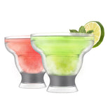 Freeze Margarita Cooling Cups that are clear and black with liquid in them.