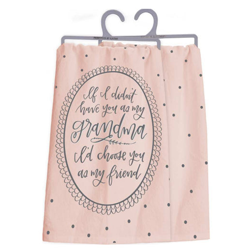 A front view and a back view of the same towel. The front has a pink polka dot design with the text that reads "If I Didn't Have You As My Grandma - I'd Chose You As My Friend" in a vintage oval border design. The back is pink with black polka dots. 