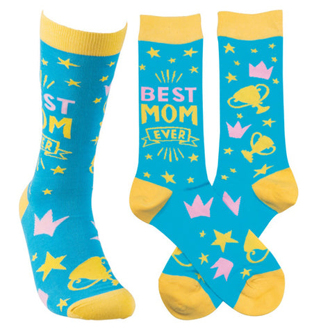 This image shows the socks from three different angles. The first shows the sock from the front. The second shows the side of the sock with the words, "Best Mom Ever" sewn against its blue background. The third shows the yellow and pink stars and cups against its blue background.