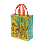 The Daily "Lookin' Sharp" Tote bag stands alone with the design of the green cactuses and the desert. 