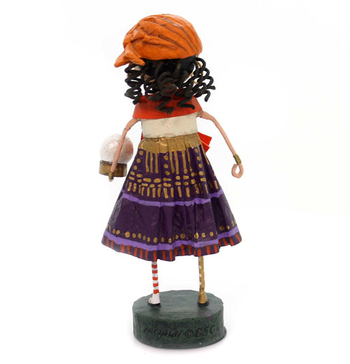 A back view of The Gypsy Rose figurine is shown. 
