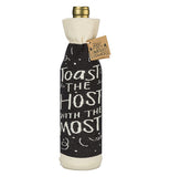 This side of the bottle cover shows the words, "Toast the Host with the Most" in white lettering.