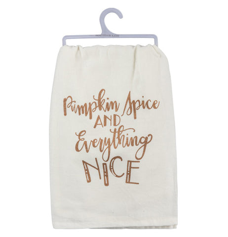 The "Pumpkin Spice" dish towel has copper metallic lettering that reads "Pumpkin Spice and Everything Nice" over a white background. 