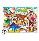 The "Dinosaur Day at the Museum" puzzle features and illustration of children looking at assembled Dinosaur bones in the museum. 