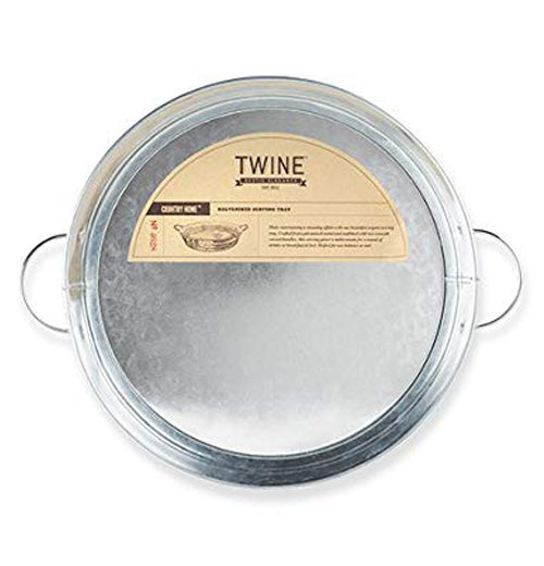 The Galvanized Steel Serving Tray is being packaged for stores or delivery.