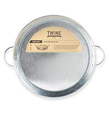 The Galvanized Steel Serving Tray is being packaged for stores or delivery.