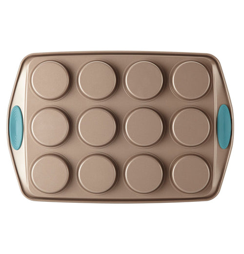 The "Blue" 12 Cup Muffin Pan is shown from the bottom that showed the deepness of the cup holes with the blue handles.