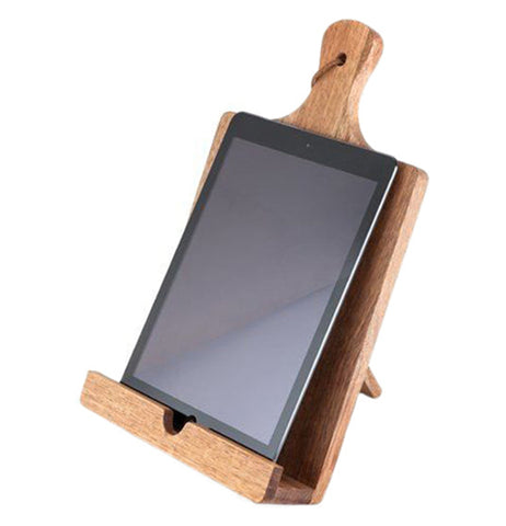 A brown wooden cooking stand holding a black tablet.