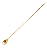 Gold bar spoon with tear drop shaped bowl and twisted stem on a white background.
