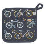 A black potholder has pictures of yellow and blue bicycles on it.