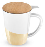 White ceramic mug with gold colored bottom with bamboo lid and stainless steel infuser on white background.