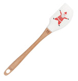 This rubber spatula with a wooden handle has a white head with a picture of Santa Claus with arms and legs spread wide.