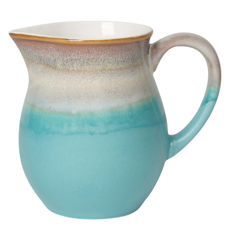 Gradient toned blue and white water pitcher.