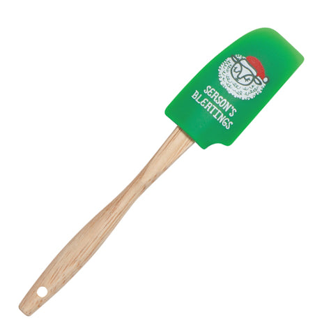This rubber spatula with a green head has a picture of a sheep wearing a red and white Santa Claus hat. Below the sheep are the words, "Season's Bleatings" in white lettering.