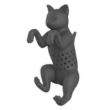 A black cat shaped infuser with its front paws curved, the middle of the cat has a bunch of holes in it.