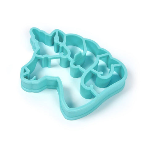 "Crack A Smile" light blue unicorn head pancake and egg mold on a white background.