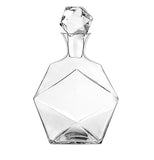 This crystal liquor decanter is shaped in a hexagonal pattern with a diamond shaped lid.