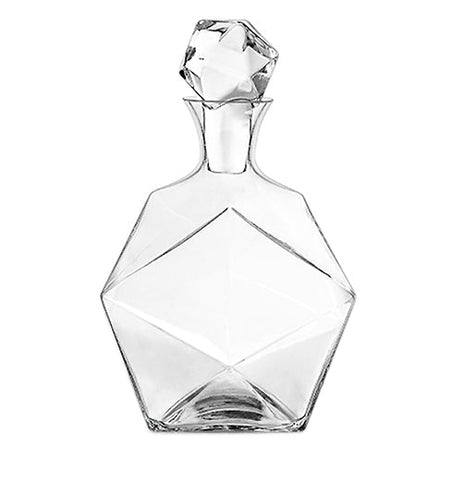 This crystal liquor decanter is shaped in a hexagonal pattern with a diamond shaped lid.