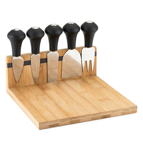 The Brace Magnetic Cheese Board and Tool Set is made of wood with a long magnetic strip to hold five tools. 