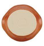 The oval-shaped baking dish is shown from the bottom.