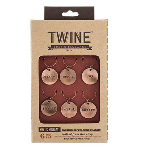 The six charms are shown inside their cardboard packaging. The word, "Twine" is shown at the top in black lettering.