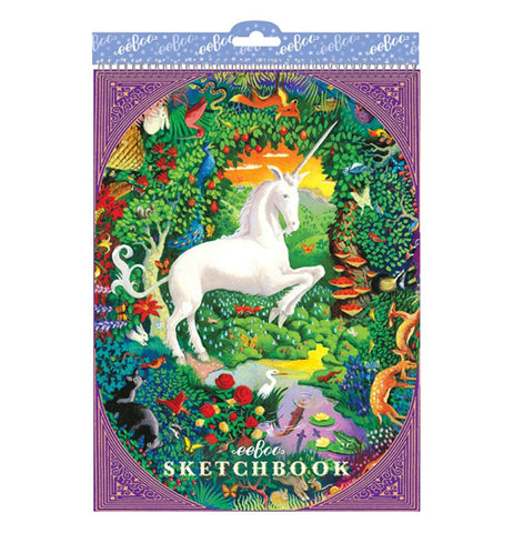 This sketchbook has a picture of a white unicorn in the middle of a green forest surrounded by trees, red mushrooms, and green leaves. The words, "eeboo Sketchbook" are shown at the bottom in white lettering.