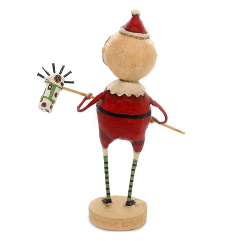 A polyresin Santa figure is holding a stick horse. The photo is from behind. There is no background. He has green striped socks that go above his knees.