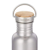 The lid has a metal loop and a bamboo top and says klean kanteen and is shown screwed onto a steel water bottle.
