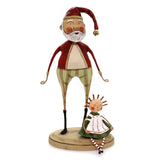This jolly santa has a santa hat on his head  with a red and white shirt with green and red striped pants with a dolly on the bottom.