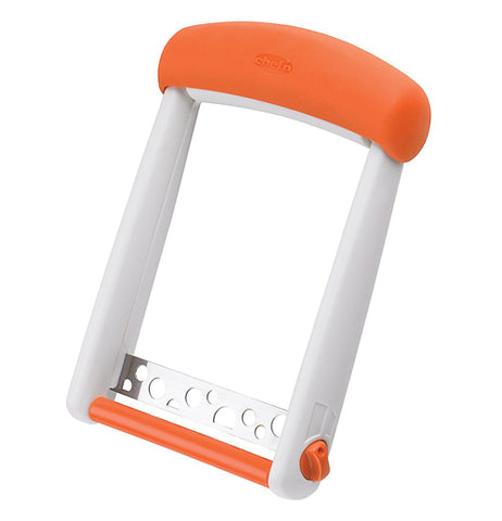 A white cheese cutter with an orange holding handle on top, an orange cylindrical roller and orange adjustable knob for the width of the silver steel slicer