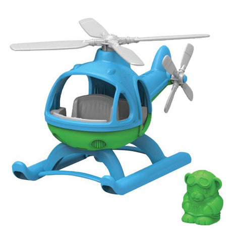 A plastic mostly blue Helicopter with grey blades and a green underbelly with a green pilot next to it