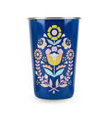 The navy blue cup with the orange and turquoise flower is shown individually.
