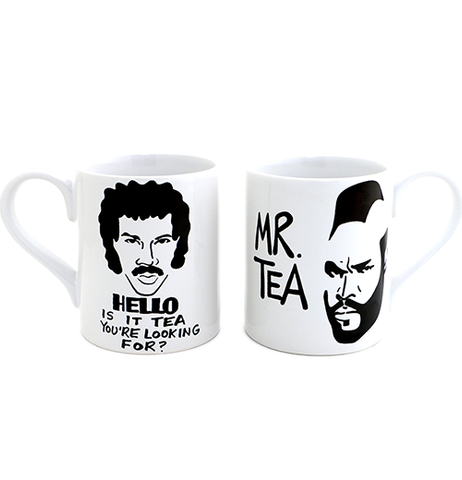 Two white mugs. On the left, the mug has Lionel Ritchies' head outlined in black with "Hello, is it tea you're looking for?" in black text underneath. On the right, the mug has Mr. Ts' head outlined in black with "Mr. Tea" in black text to the left.