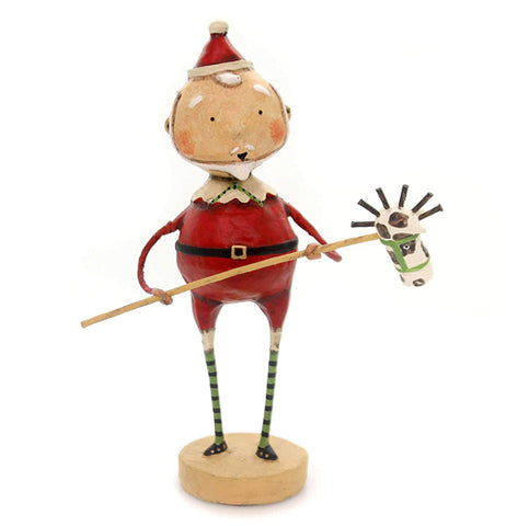 A polyresin Santa figure is holding a stick horse. The photo is from front. There is no background. He has green striped socks that go above his knees.